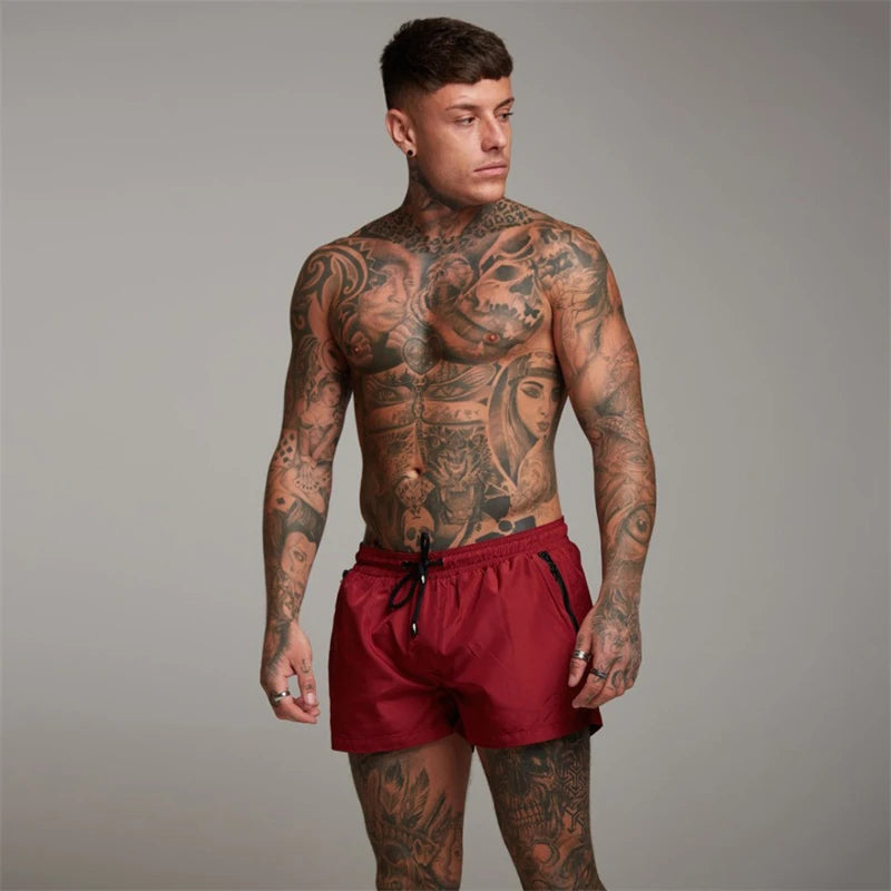 Short de bain avec poches zippées